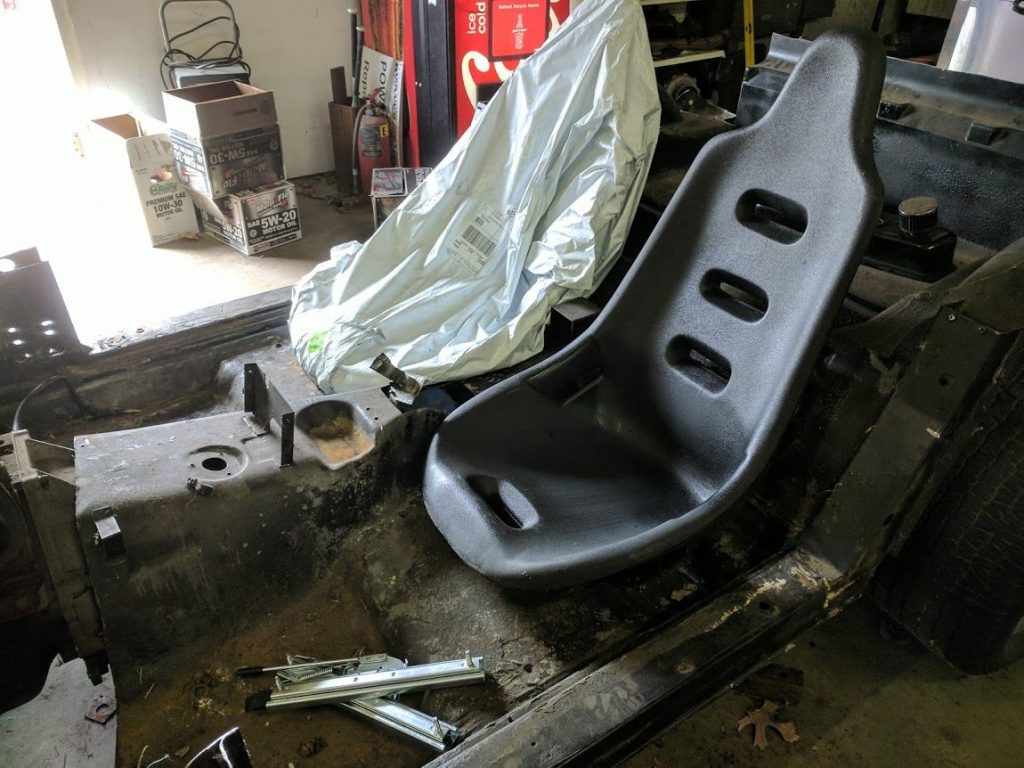 plastic racing seats from jegs in the corvette floor